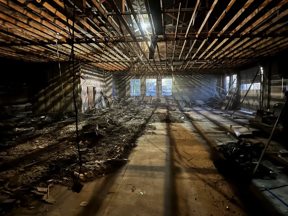 A building interior opened up to the joists during a renovation